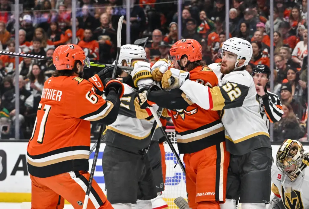 The Ducksâ Cutter Gauthier (61) and Jacob Trouba (65) tussle...