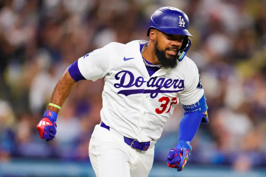The Dodgers’ Teoscar Hernandez runs after hitting a double during...