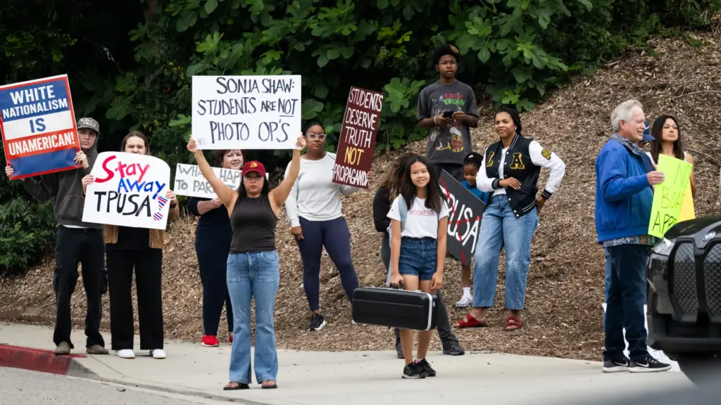 A student makes her way to class Friday, May 8,...