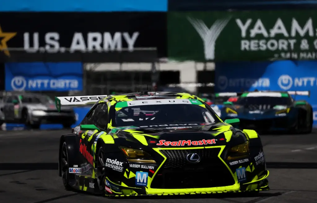 The Vasser Sullivan Racing (12) car leads the GTD field...