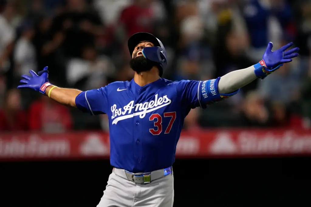 The Dodgers’ Teoscar HernÃ¡ndez gestures after hitting a two-run home...