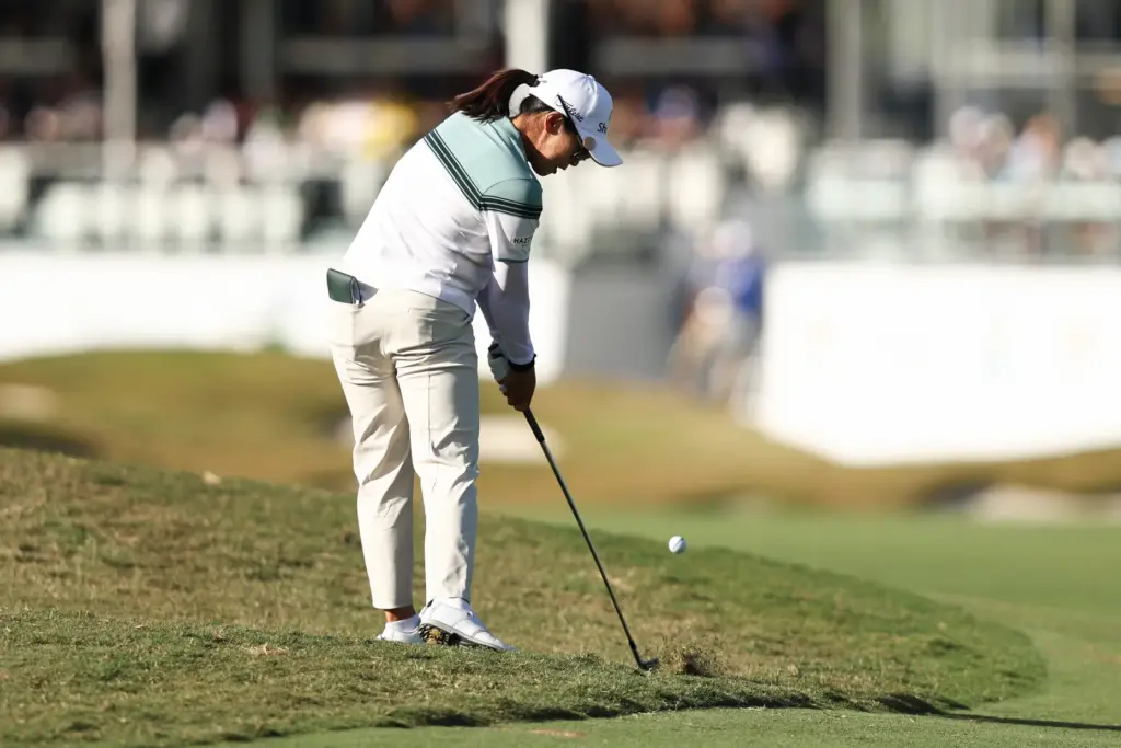 Jin Hee Im hits from the rough on the eighteenth...