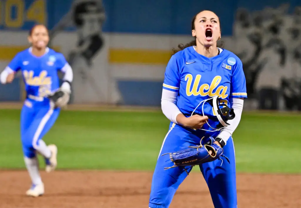 Starting pitcher Taylor Tinsley #23 of the UCLA Bruins reacts...