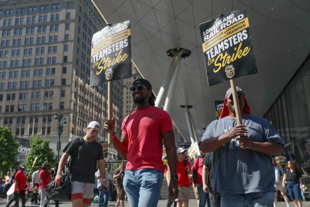 Long Island Rail Road workers walk on the picket line outside Penn Station.