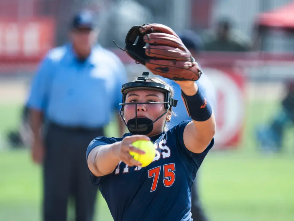 Cypress’ Chach Stamper gets ready to deliver a pitch against...