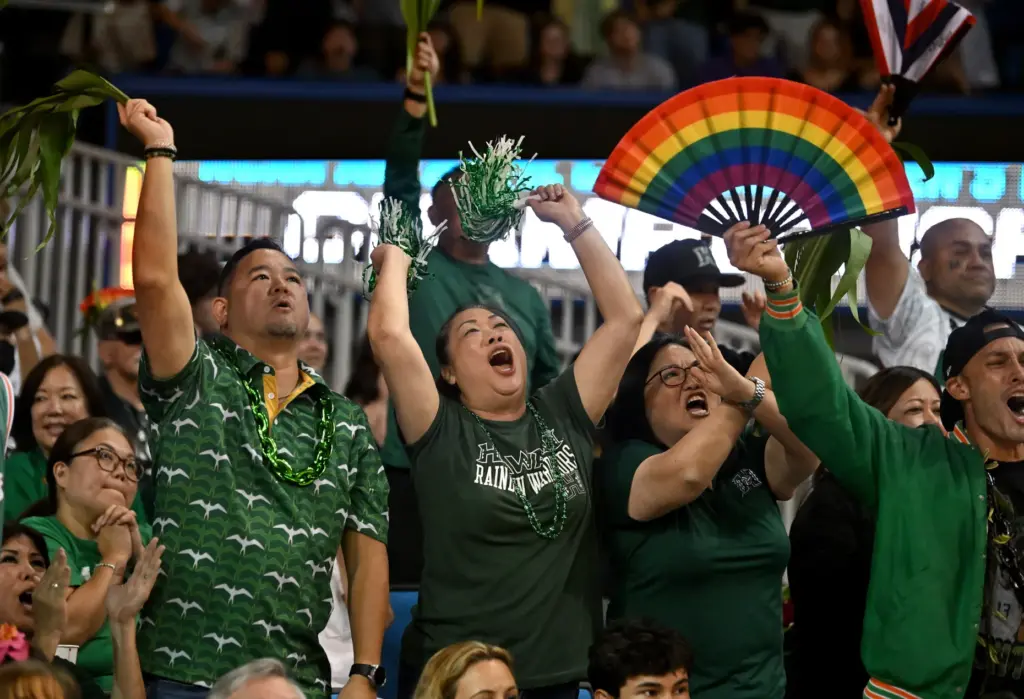 Hawaii fans celebrate during the NCAA men’s volleyball national championship...