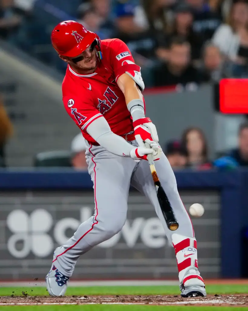Angels star Mike Trout hits a single during the sixth...