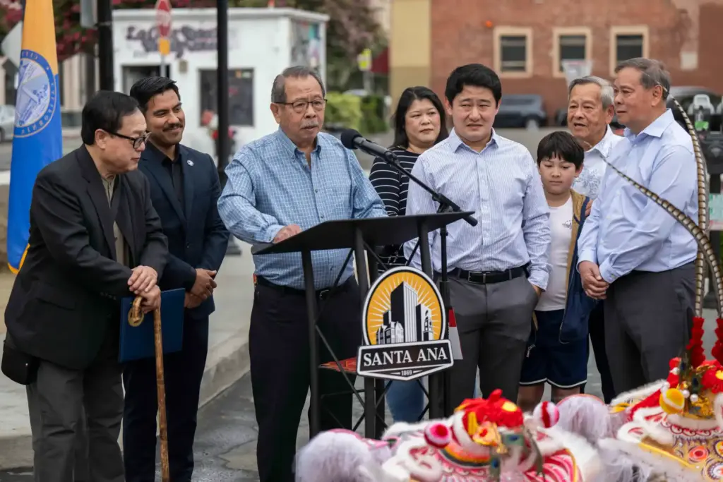 Louis Lau, representing other members of the Lau family addresses...