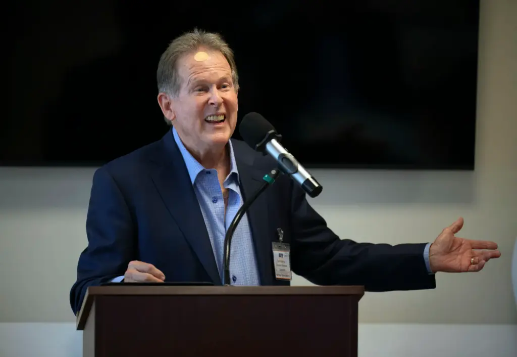 Ken Robertson of Riverside Charitable Corporation thanks those involved with...