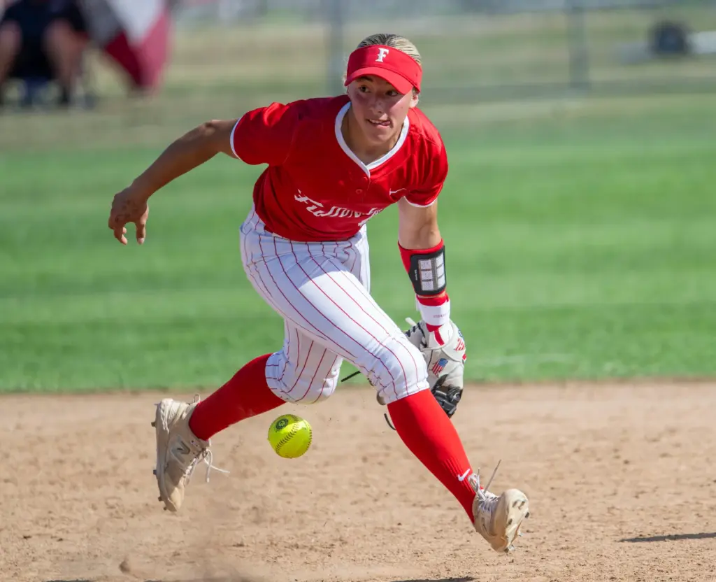 Fullerton shortstop Soleil Luna is unable to come up with...