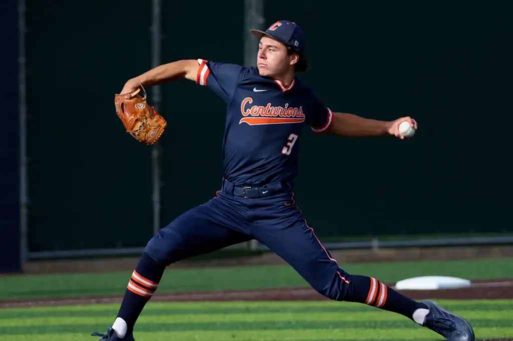 Cypress junior Tate Belfanti pitches in relief against St. John...