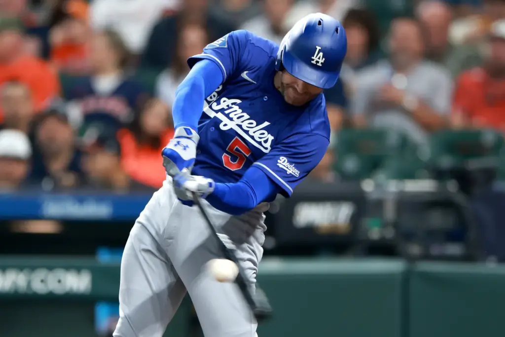 The Dodgers’ Freddie Freeman hits a double during the first...