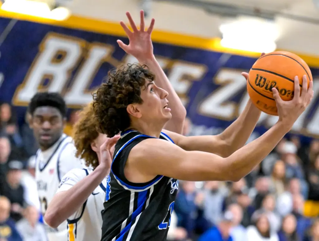 Acen Jimenez (24) of La Habra drives to the basket...
