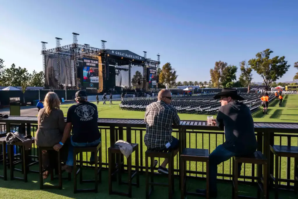 Music fans wait for the start of the Billy Currington...