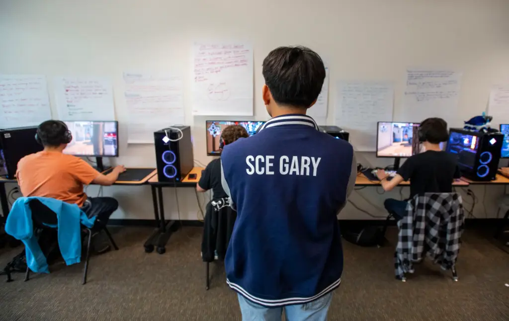A member of the Santiago Canyon Collegeâs esports club monitors...
