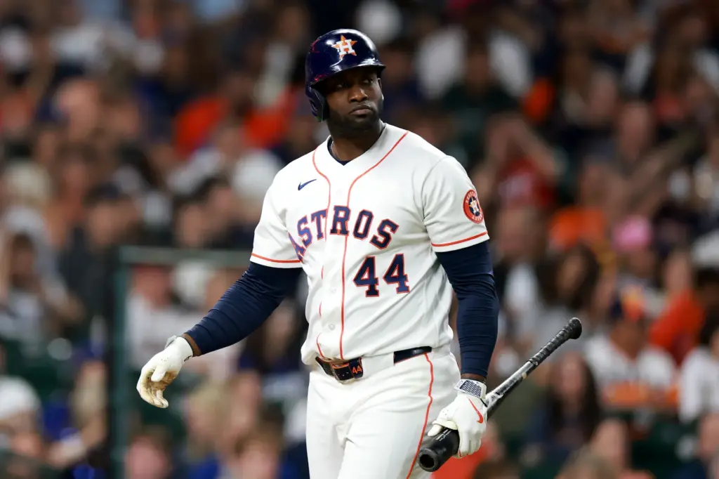 The Houston Astros’ Yordan Alvarez walks back to the dugout...