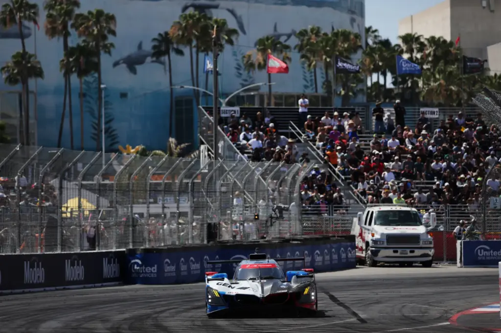 The BMW M Team WRT GTP car (25) races through...