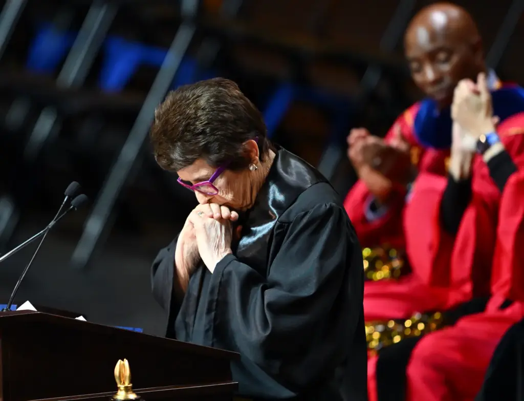 Billie Jean King pauses for a moment as she delivers...
