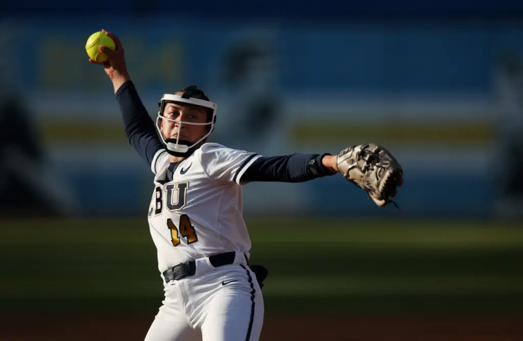 California Baptistâs Miranda De Nava (14) delivers a pitch to...