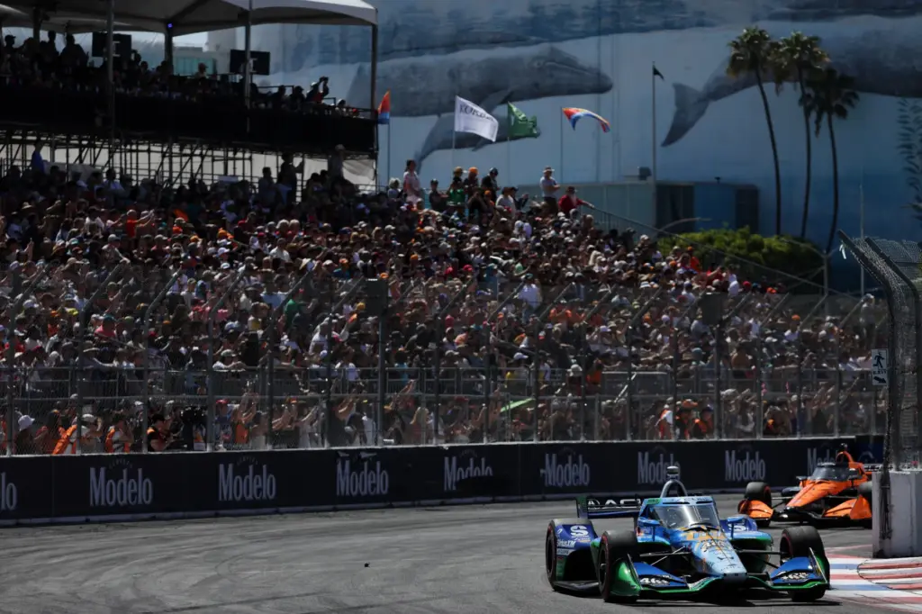 Indycar driver Felix Rosenqvist leads the field at the end...