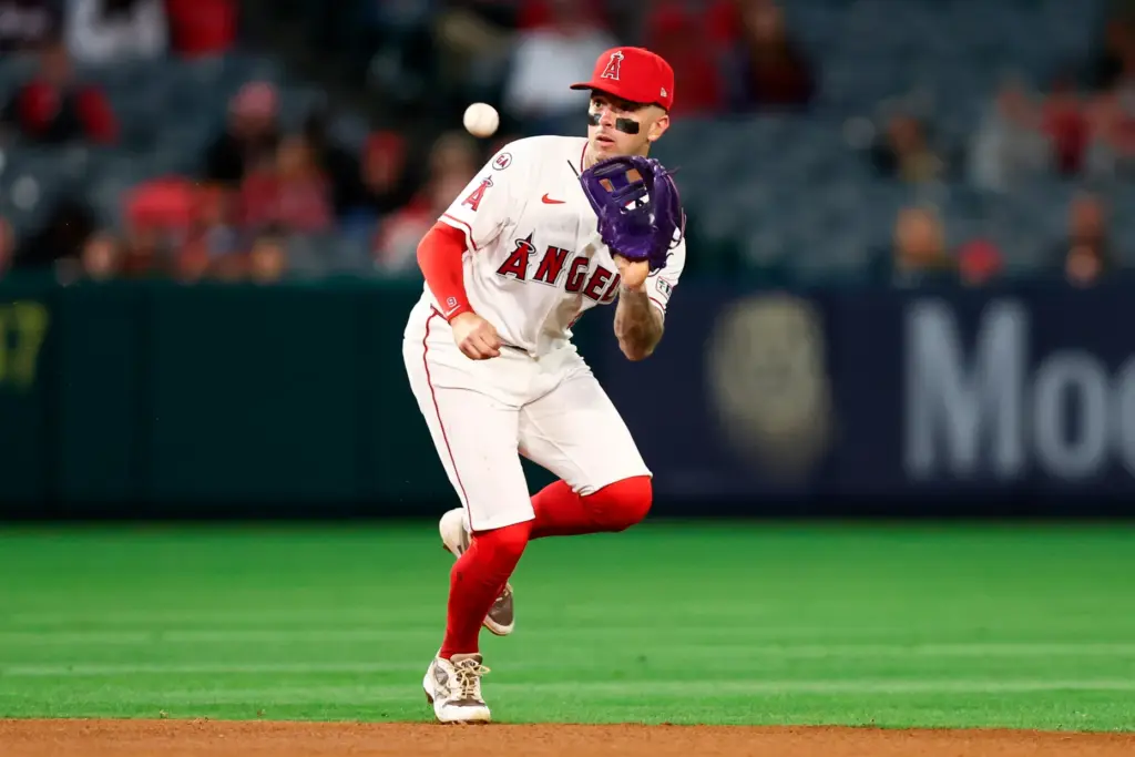 Angels shortstop Zach Neto makes a catch during the ninth...