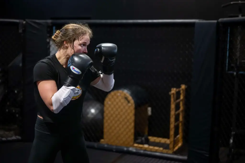 Former UFC champion and Olympic medalist Ronda Rousey prepares for...