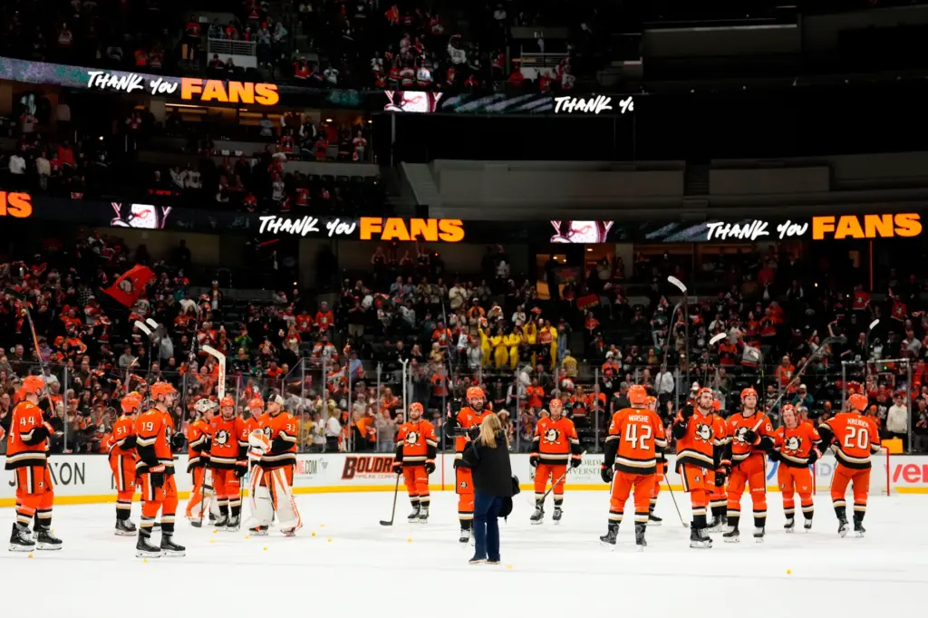 Ducks players acknowledge the fans after their season-ending 5-1 loss...