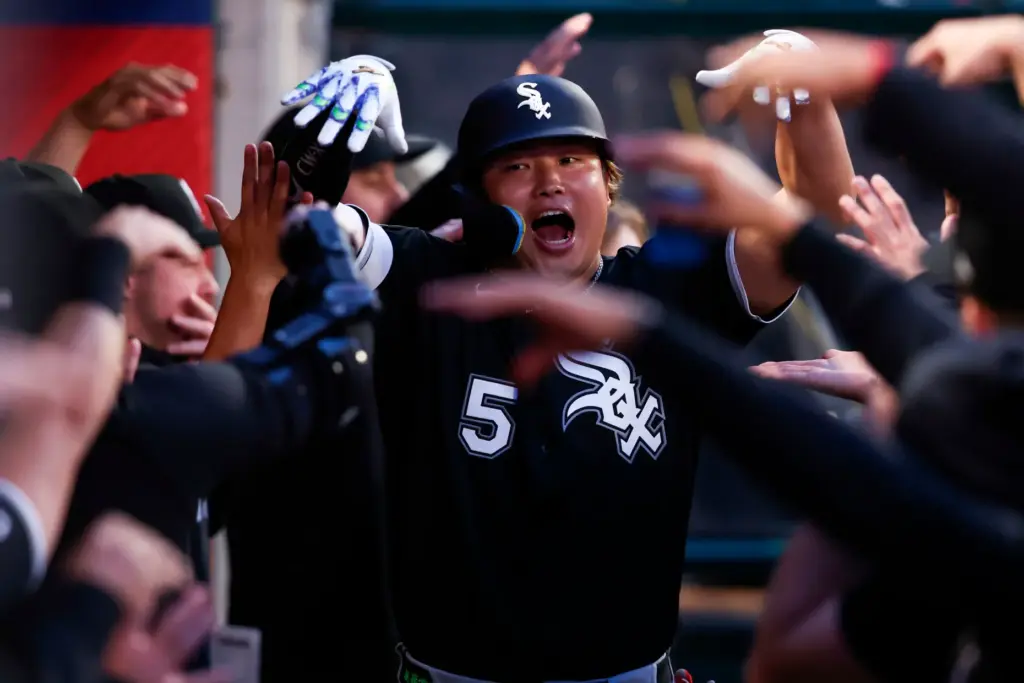 The Chicago White Sox’s Munetaka Murakami celebrates in the dugout...