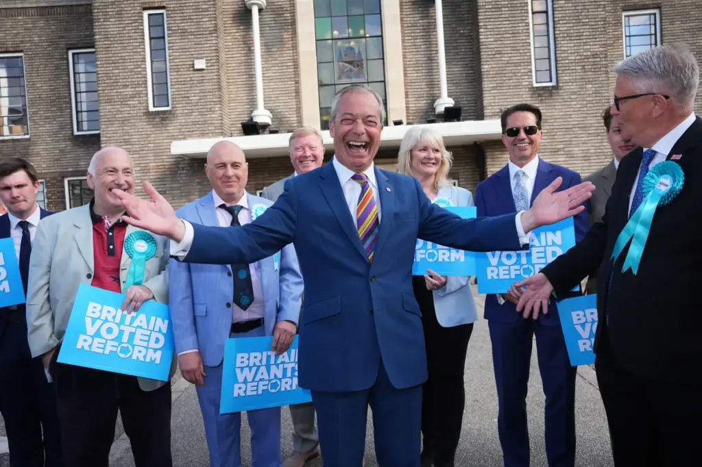 Reform UK leader Nigel Farage poses for a photo.