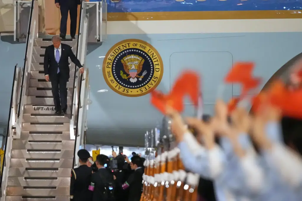 President Donald Trump arrives on Air Force One, Wednesday, May...