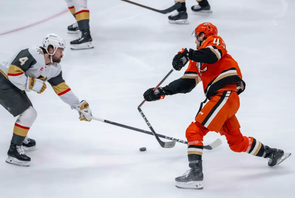 The Ducksâ Beckett Sennecke, right, breaks his stick while trying...