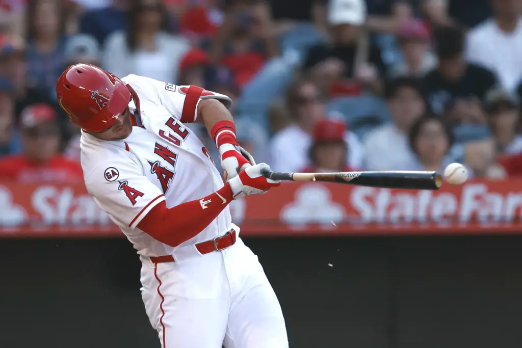 The Angels’ Mike Trout hits an RBI single that scored...