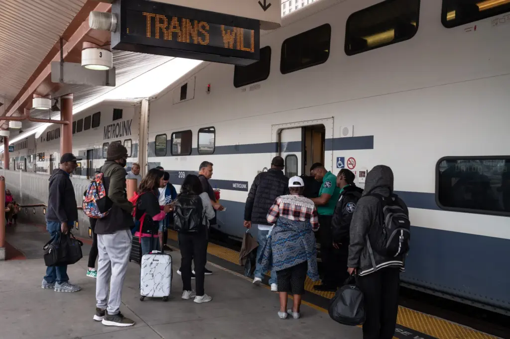 Passengers board the Metrolink at Union Station on Tuesday, May...