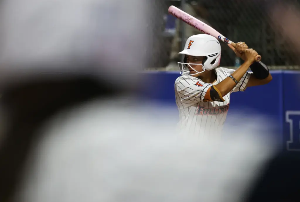 Cal State Fullertonâs Sarah Perez stands in the batterâs box...