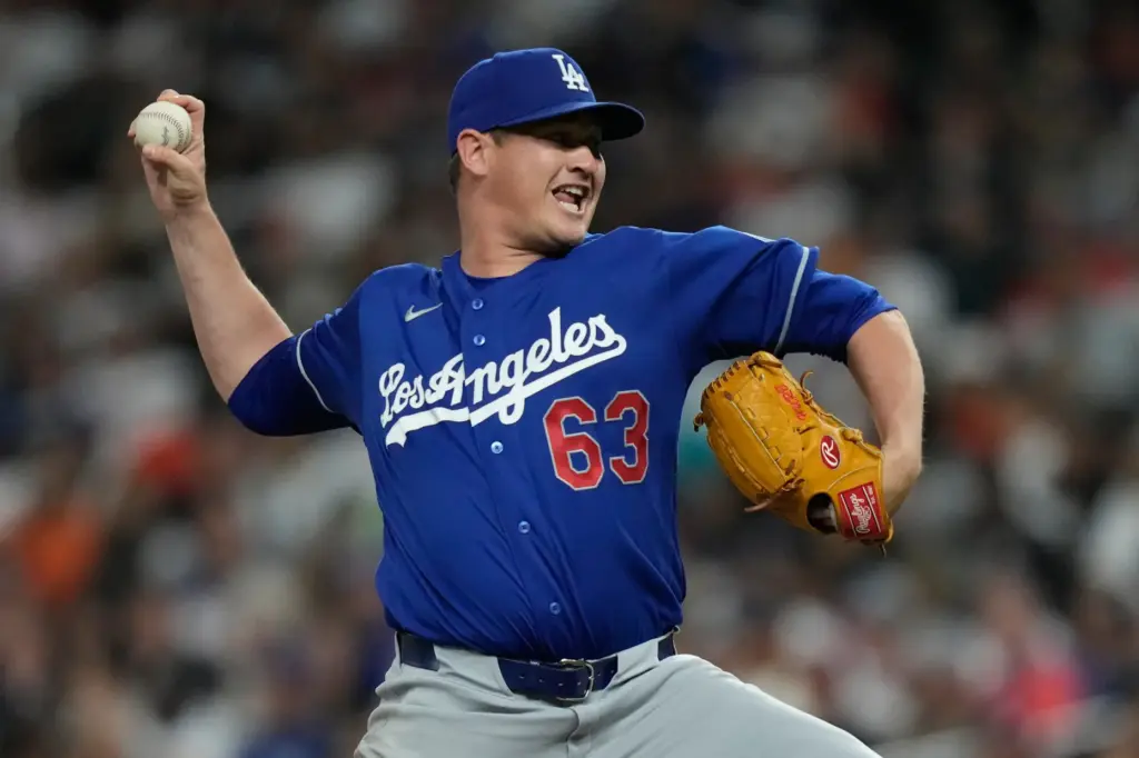 Dodgers relief pitcher Kyle Hurt throws to the plate during...