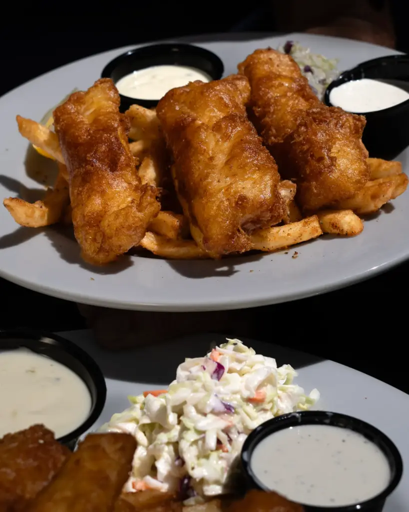 Woodyâs Wharf signature dish â Fish & Chips â served...