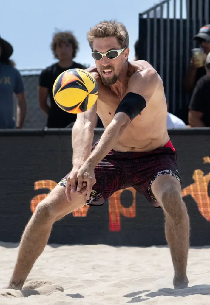 Taylor Crabb returns the ball during the AVP menâs finals...