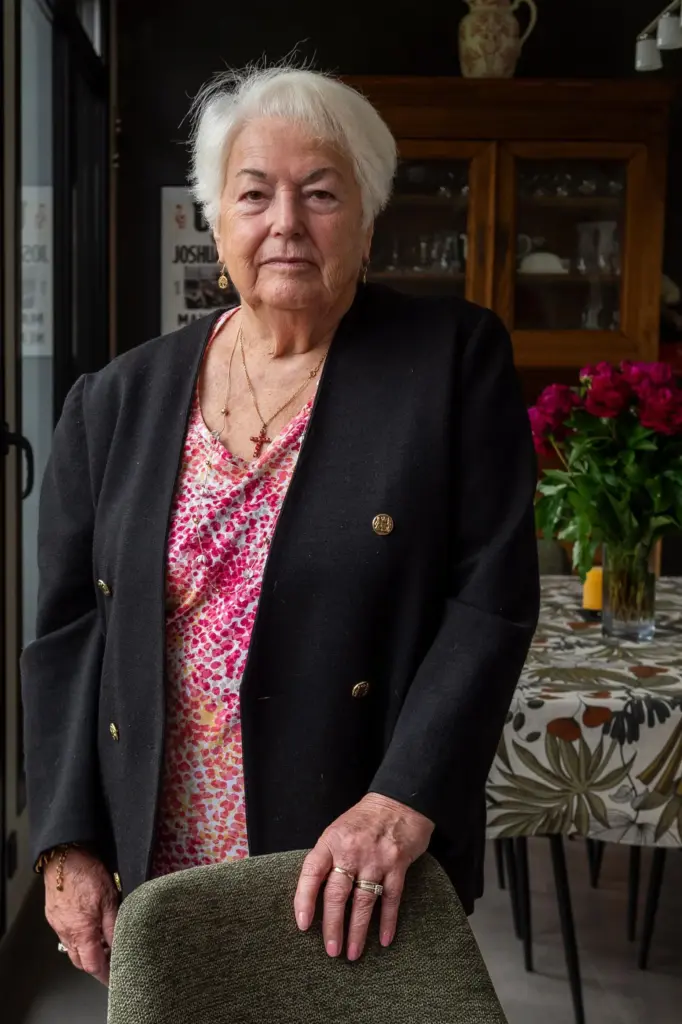 Marie-Therese Ross-Mahe, an 85-year-old French widow of a U.S. military veteran, poses in Orvault, France.