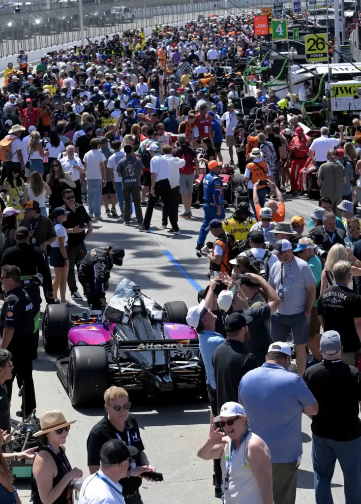 Race fans jam the pit lane prior to the 51st...