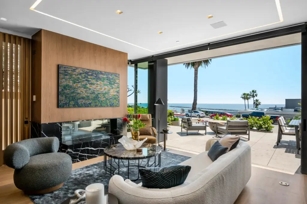 The main living area opens to a front ocean-facing patio....