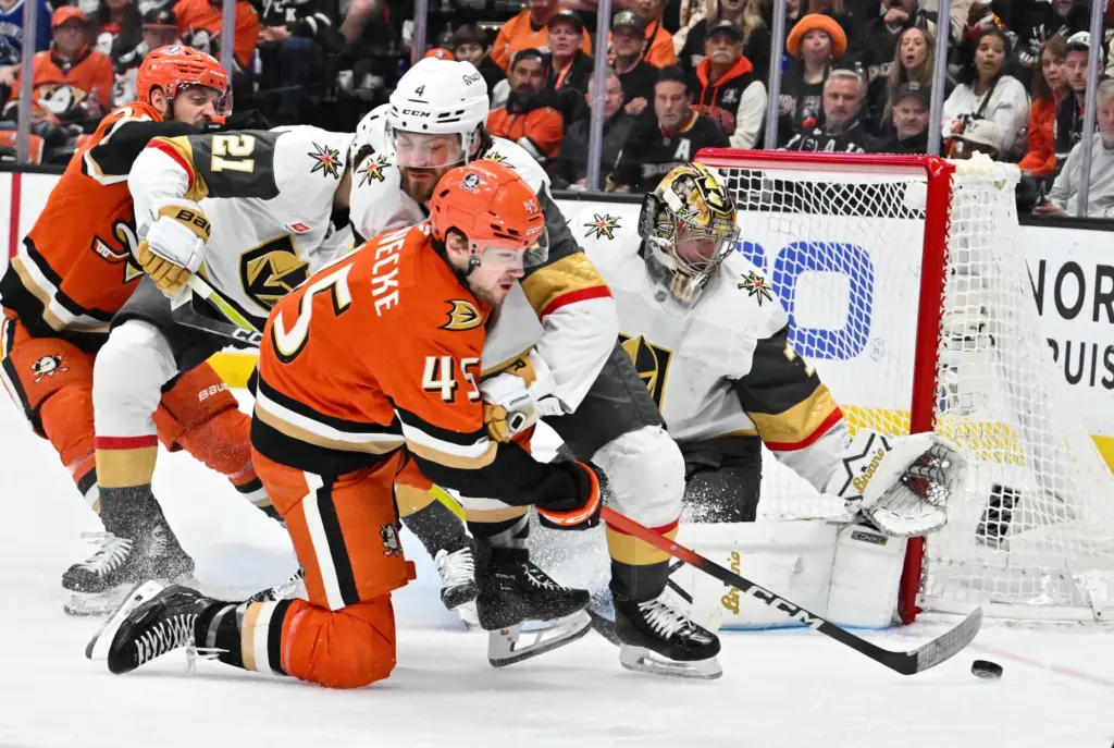 The Ducksâ Beckett Sennecke (45) tries to get by the...