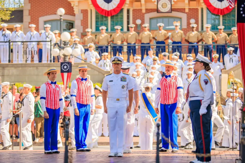 U.S. Sailors, Marines and Coast Guardsmen during a flag retreat...
