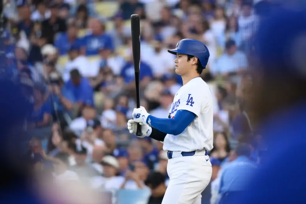 Dodgers star Shohei Ohtani stands in the on-deck circle during...