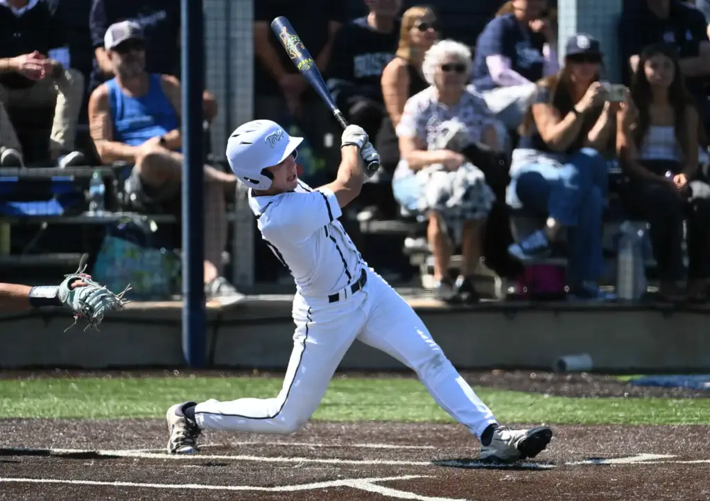 Grant Horsley (30) of Newport Harbor hits in the first...