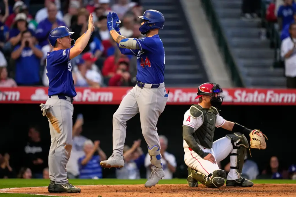The Dodgers’ Andy Pages, center, is congratulated by teammate Will...