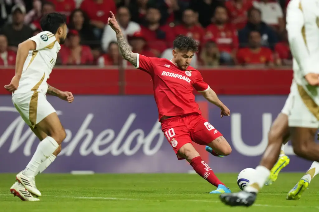 Toluca FC’s Jesus Angulo attempts a shot on goal during...