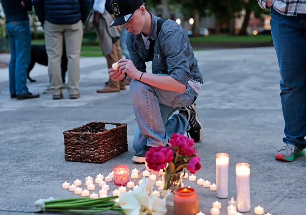 Kaeden Beck, 16, lays down electric candles