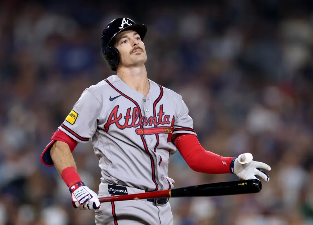 The Atlanta Braves’ Mike Yastrzemski shows his frustration after striking...