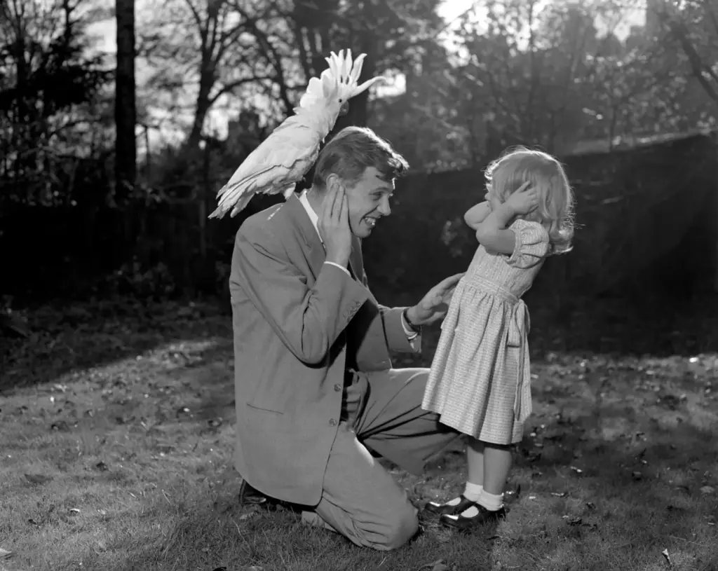 FILE – Three year old Susan and her father David...