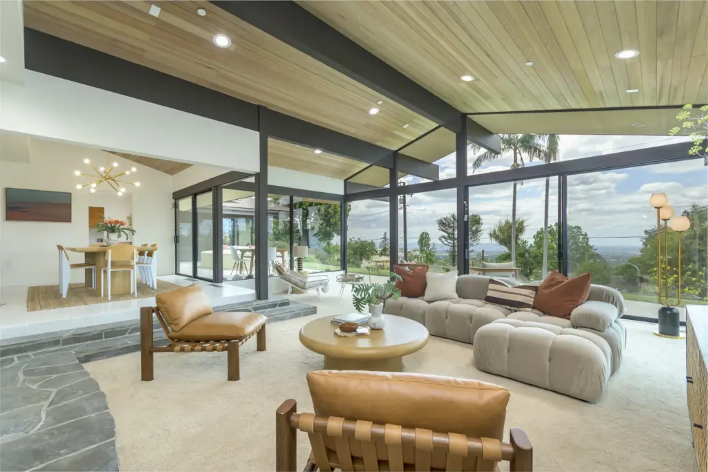 The living room, with the dining room beyond. (Photo by...